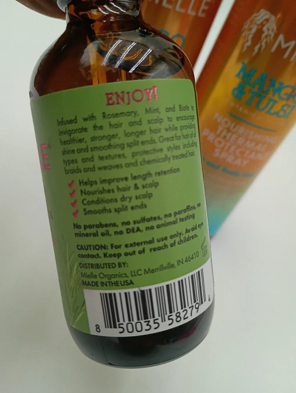 Mielle Haircare Scalp & Hair Strengthening Oil And Thermal Protectant Spray.